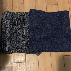 Two knitted infinity scarves.